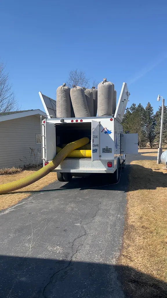 Hafeman's truck with duct vacuum hose